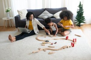 Mix race family play toy at home.